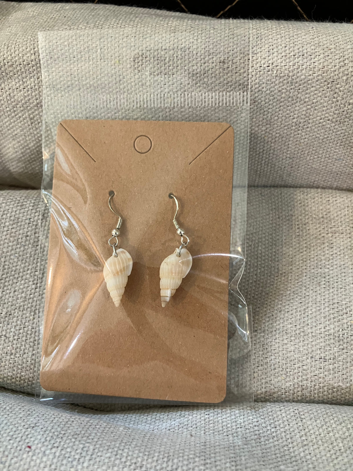 Cream snail shell earrings by Tonya Arnold