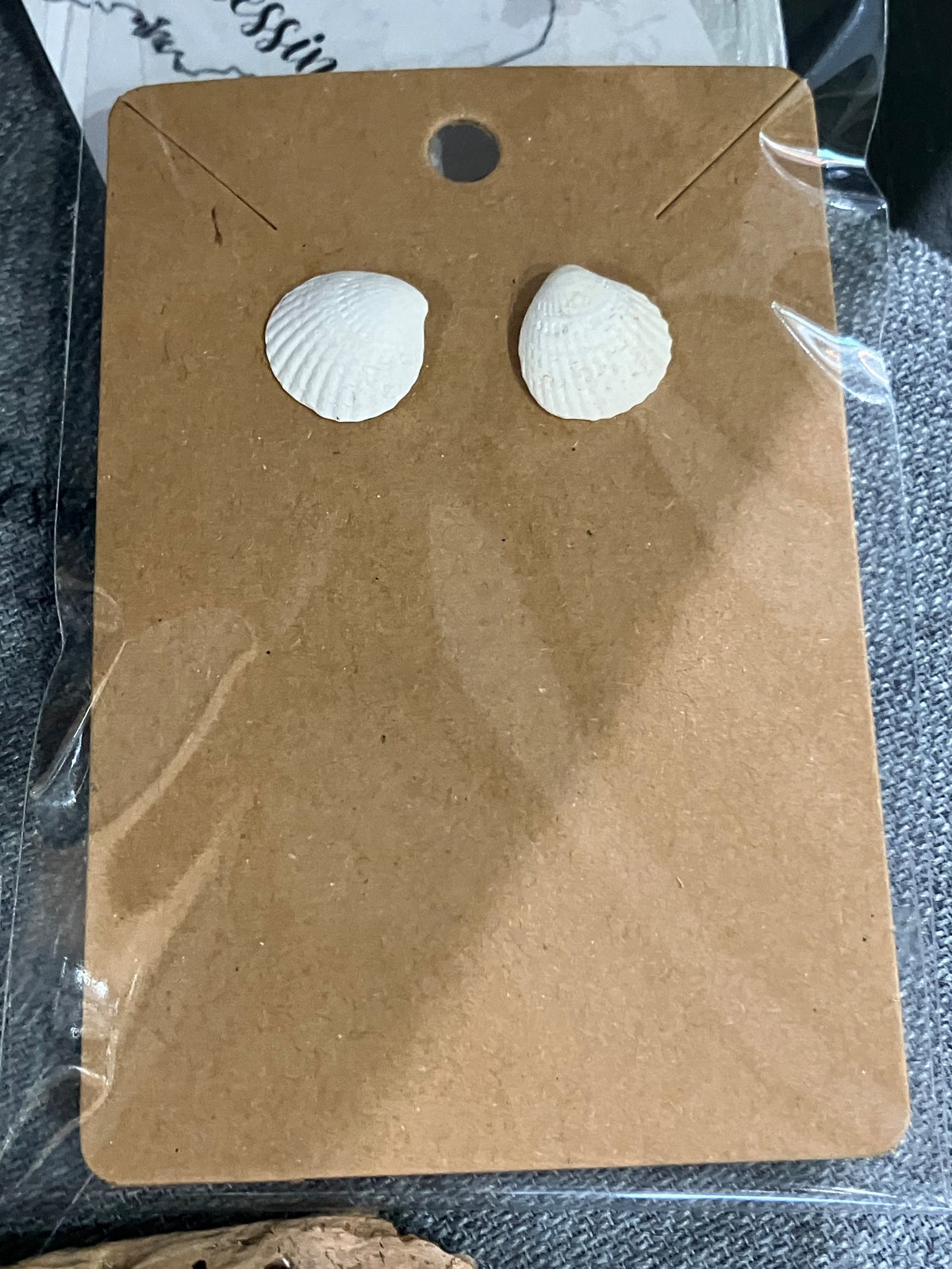 Tiny white shell earrings by Tonya Arnold