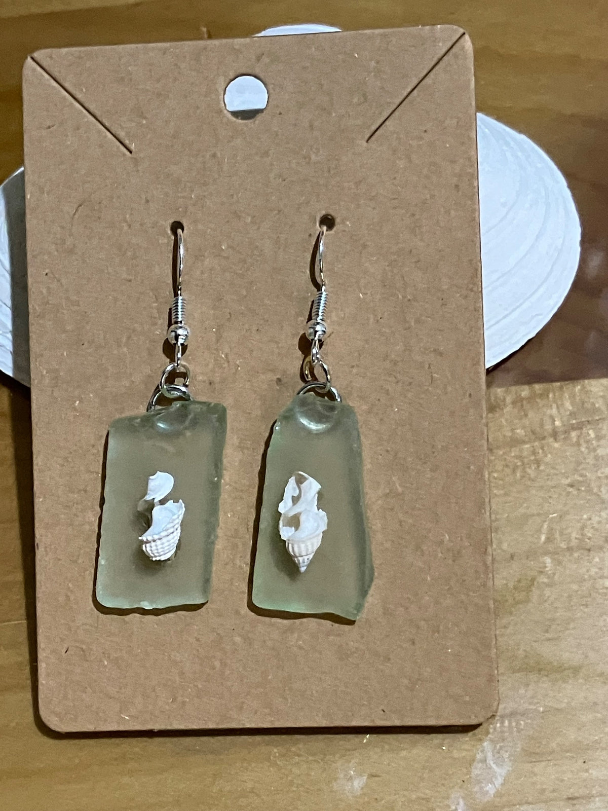 Earrings pale green seaglass spirals by Tonya Arnold
