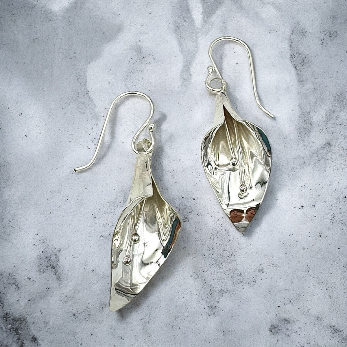 SS Trumpet Flower Earrings by Sausalito Precious Metals Inc.